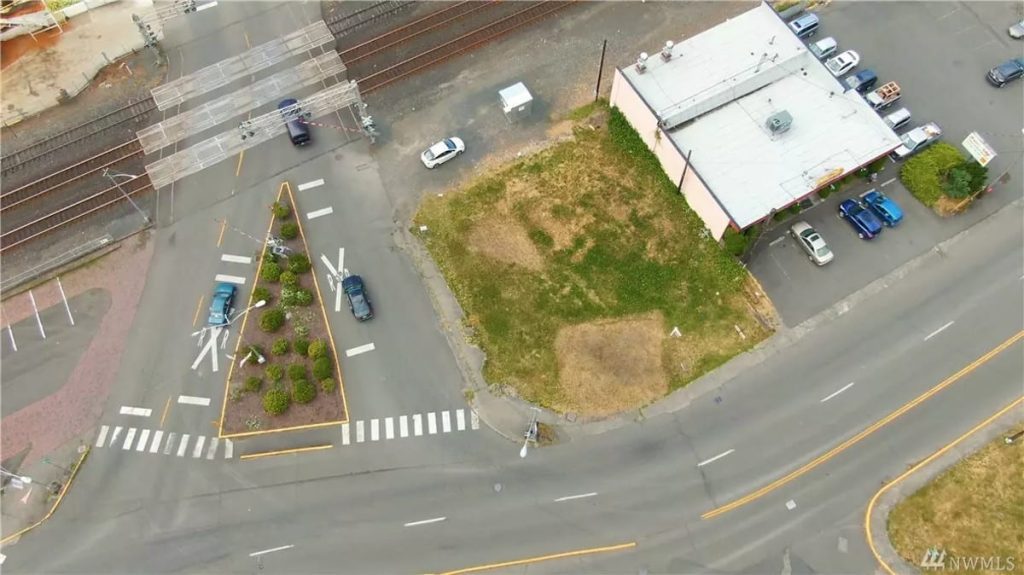 Bird's eye view of vacant grass lot available as one of the Chehalis Rentals
