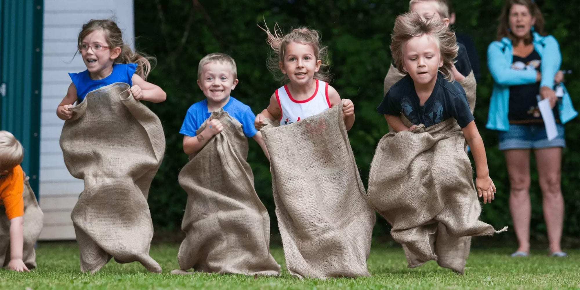 Children competing in a sack race